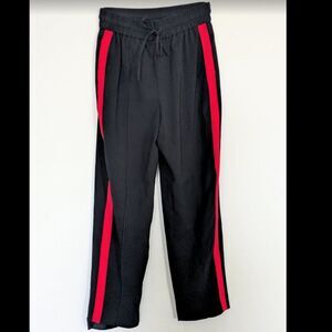 Express size XS black drawstring pants with red stripes down legs